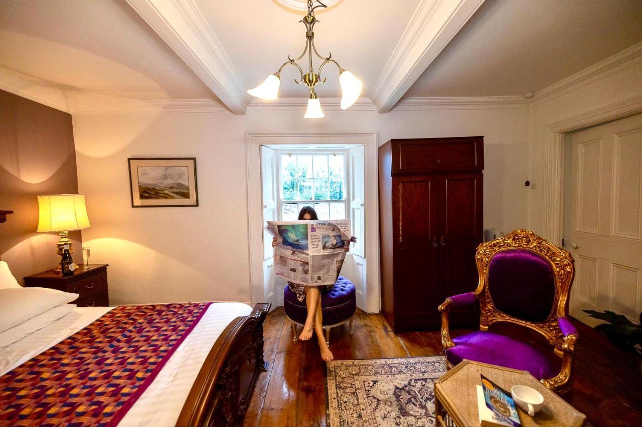 Clone Country House Aughrim Exterior photo A guest reading the Irish Times in the hotel