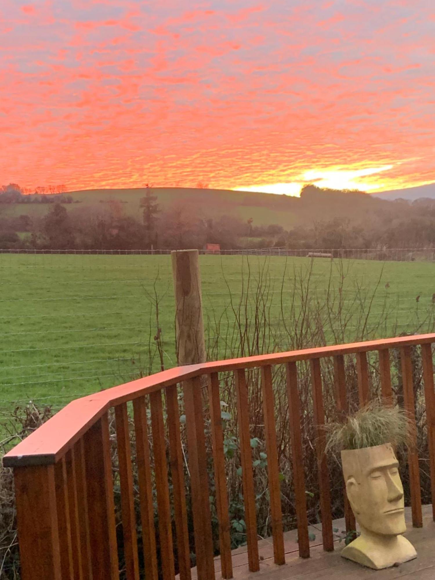 Clone Country House Aughrim Exterior photo Sunset over the Blackdown Way