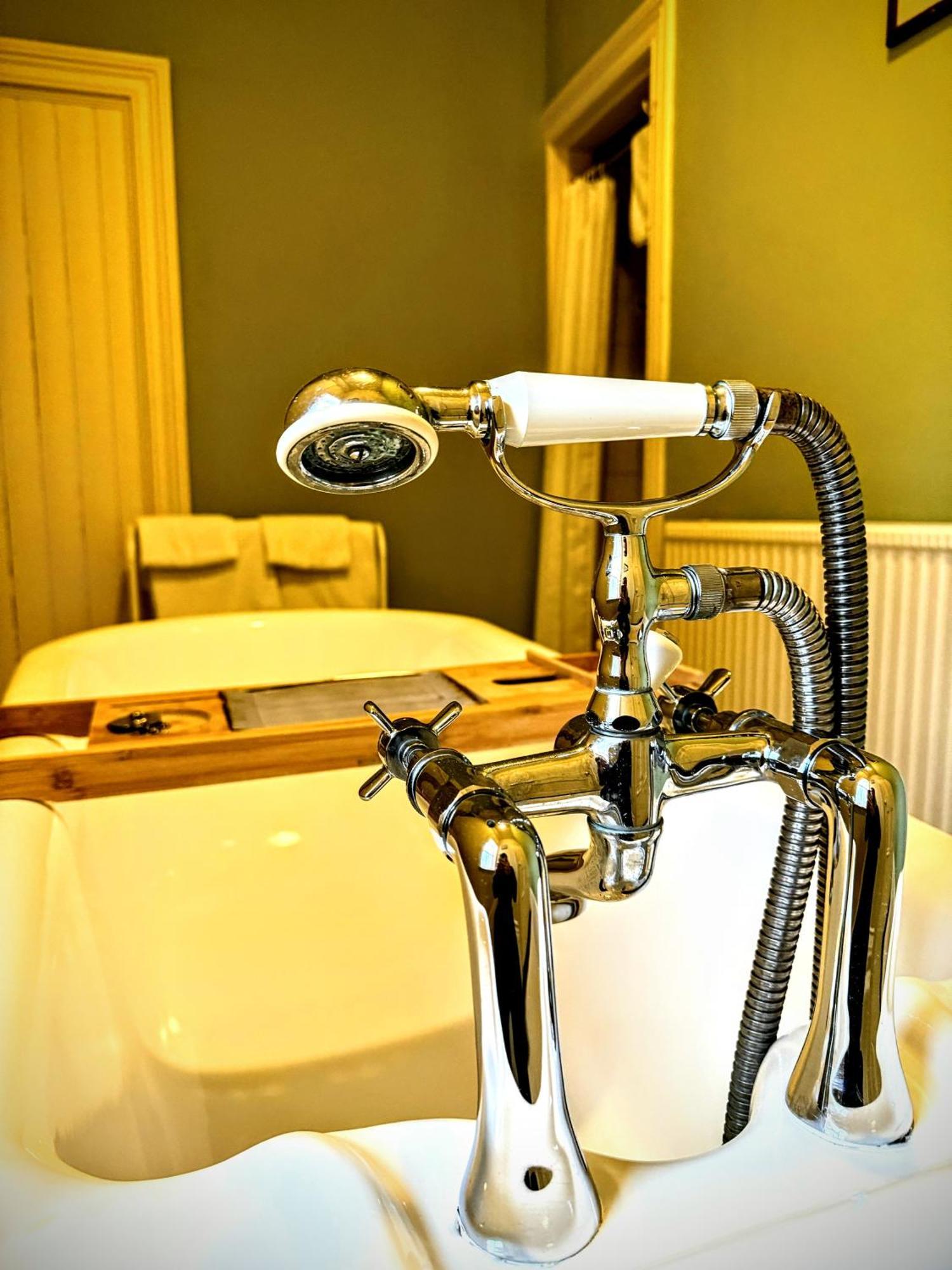 Clone Country House Aughrim Exterior photo A shower faucet